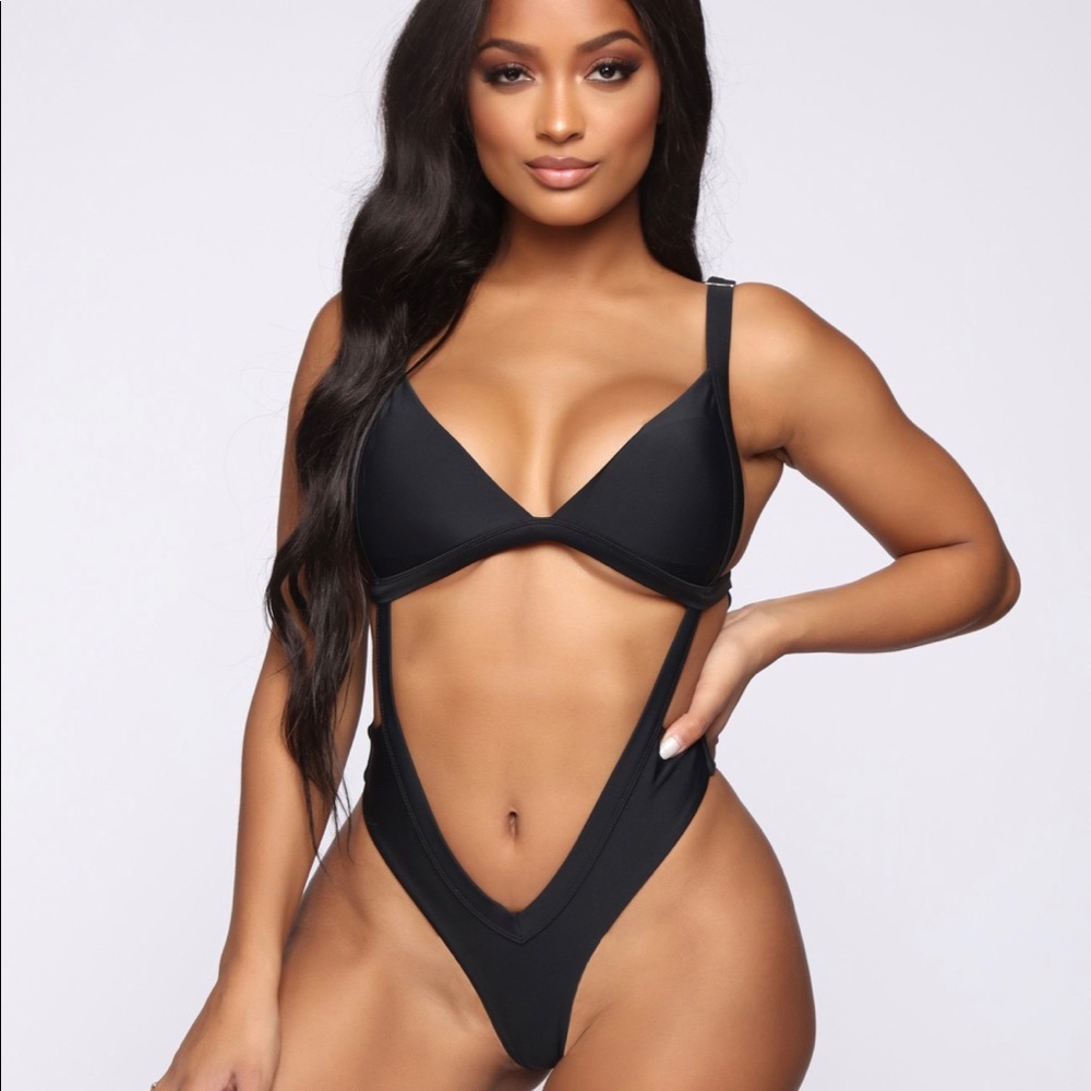 **Never worn, Never opened**Black 1 piece swimsuit